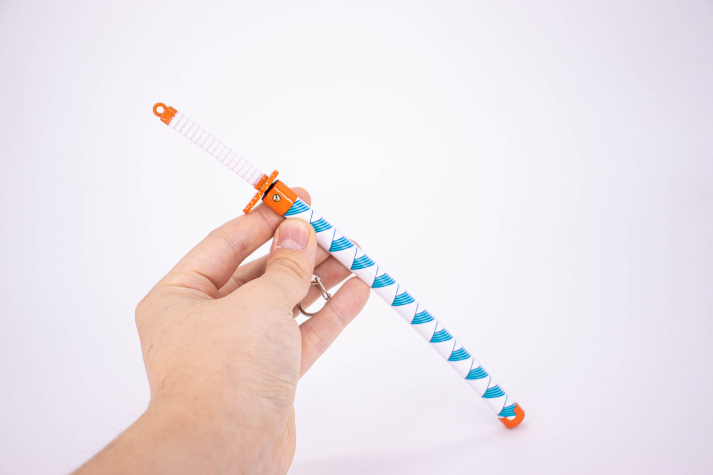 DEMON SLAYER – KYOJURO RENGOKU’S NICHIRIN SWORD KEYCHAIN