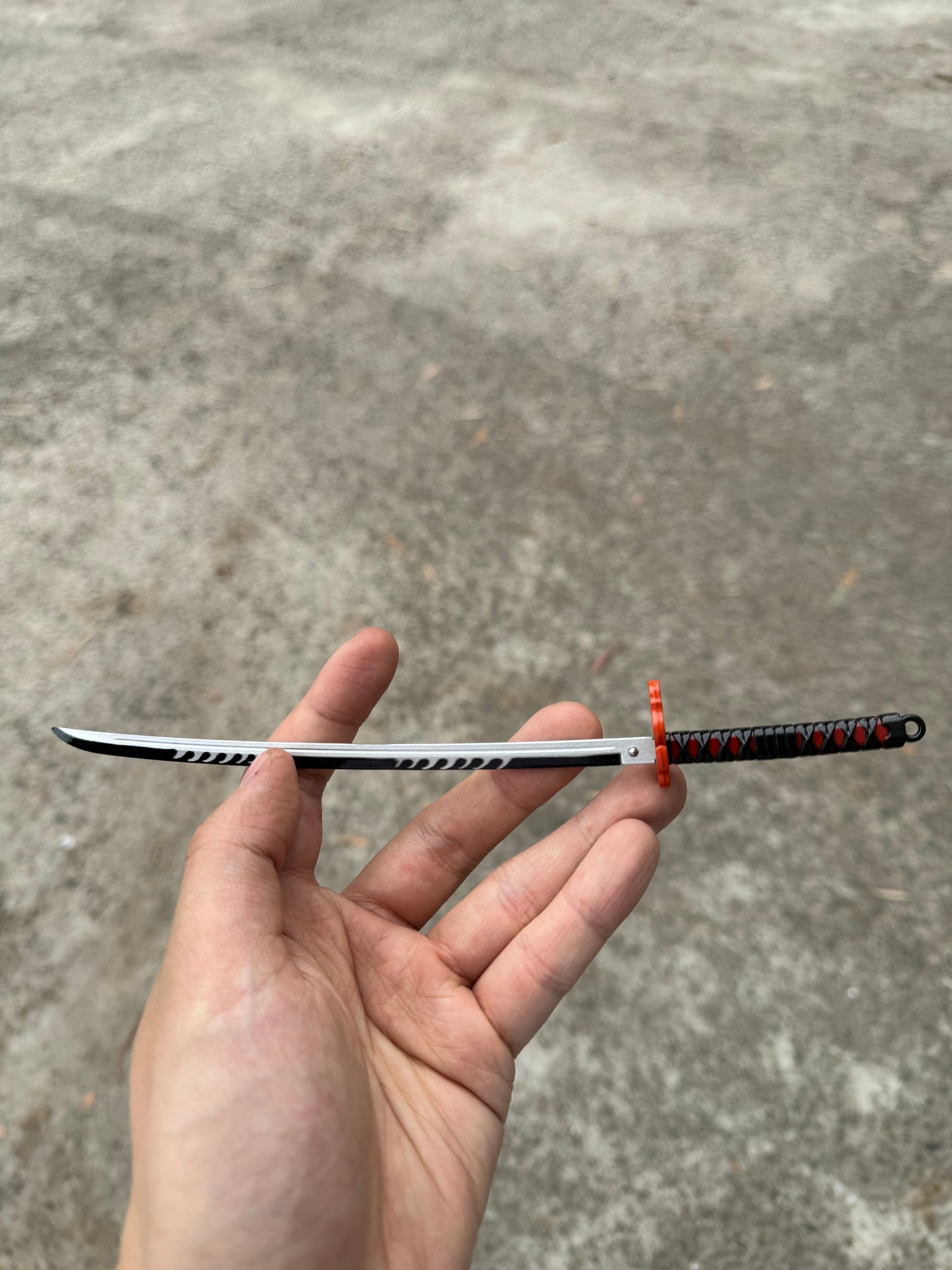 DEMON SLAYER – TANJIRO KAMADO’S FINAL NICHIRIN SWORD V2 KEYCHAIN