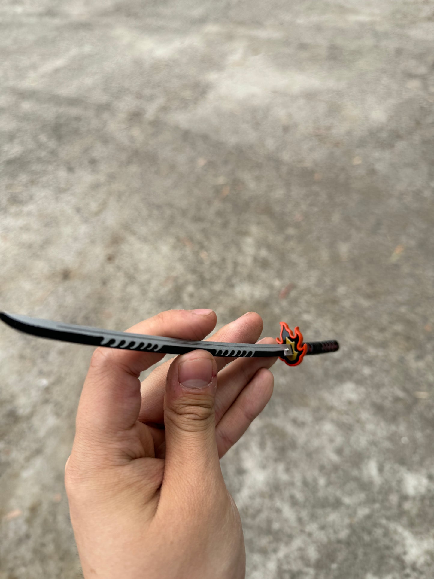 DEMON SLAYER – TANJIRO KAMADO’S FINAL NICHIRIN SWORD V2 KEYCHAIN