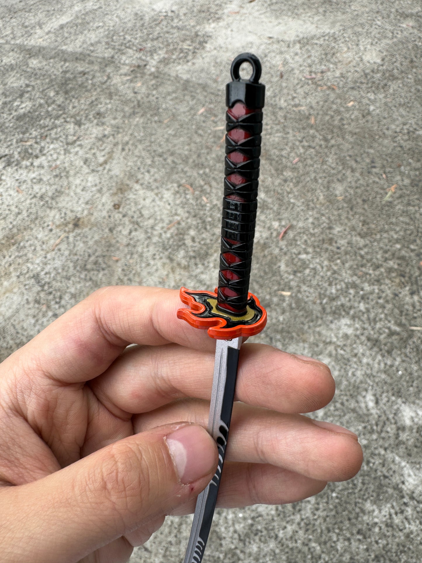 DEMON SLAYER – TANJIRO KAMADO’S FINAL NICHIRIN SWORD V2 KEYCHAIN