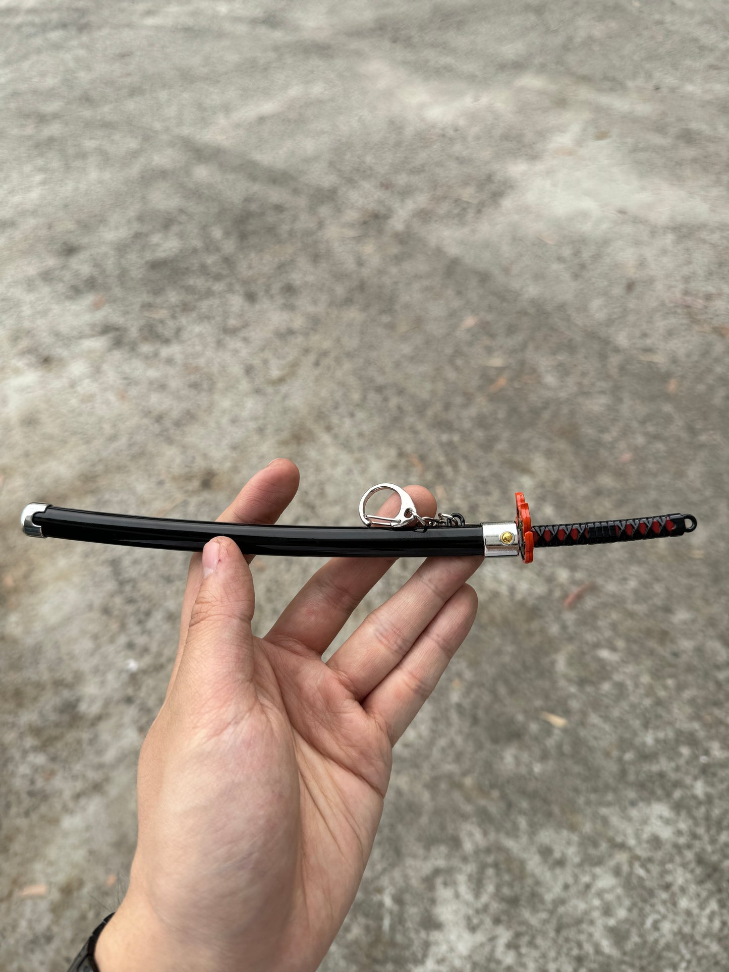 DEMON SLAYER – TANJIRO KAMADO’S FINAL NICHIRIN SWORD V2 KEYCHAIN