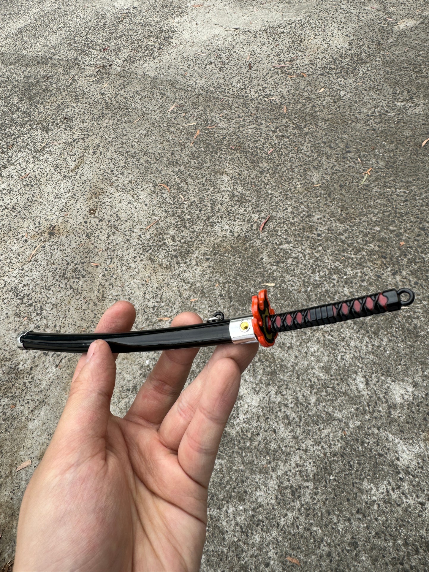 DEMON SLAYER – TANJIRO KAMADO’S FINAL NICHIRIN SWORD V2 KEYCHAIN