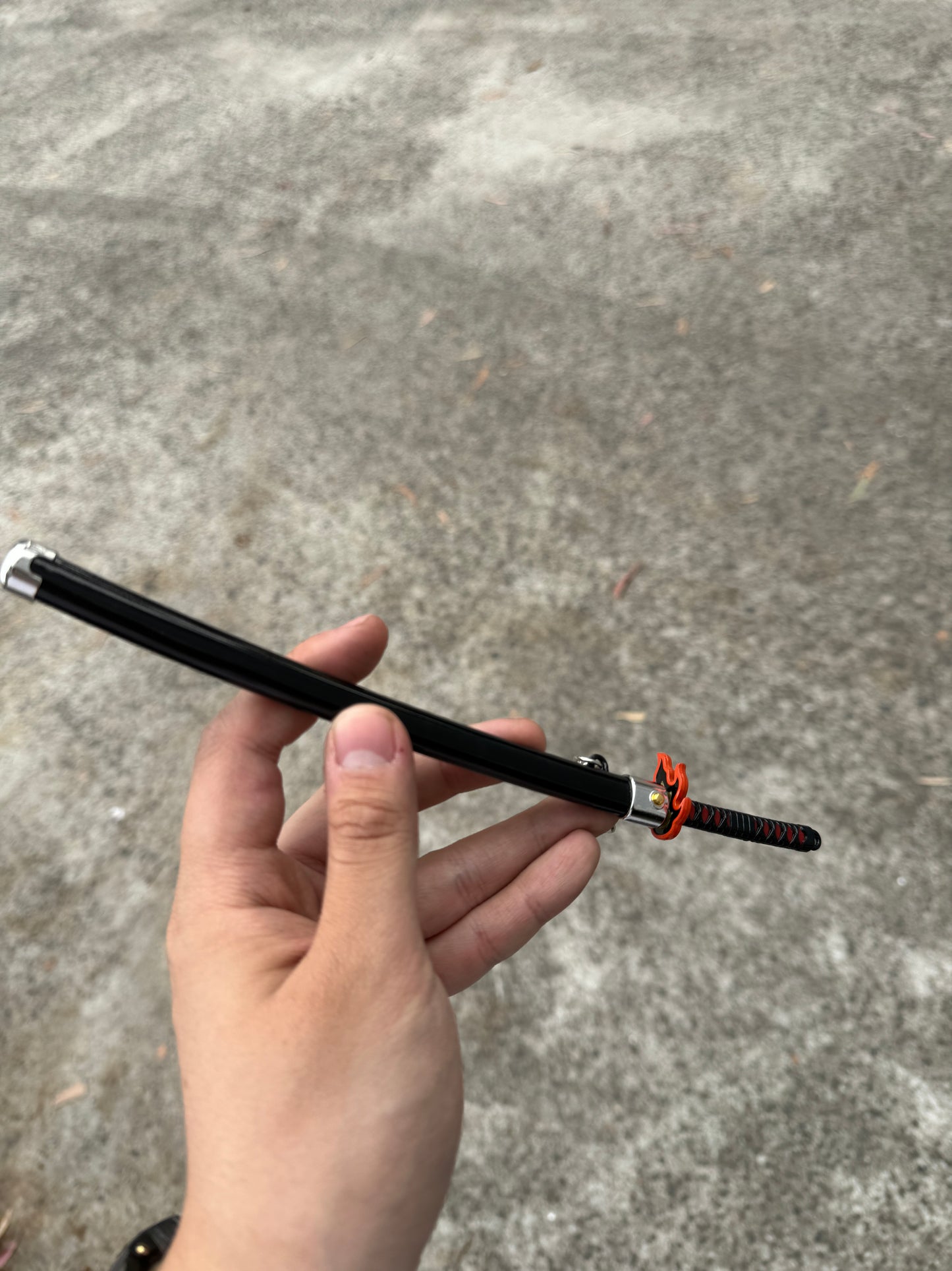 DEMON SLAYER – TANJIRO KAMADO’S FINAL NICHIRIN SWORD V2 KEYCHAIN