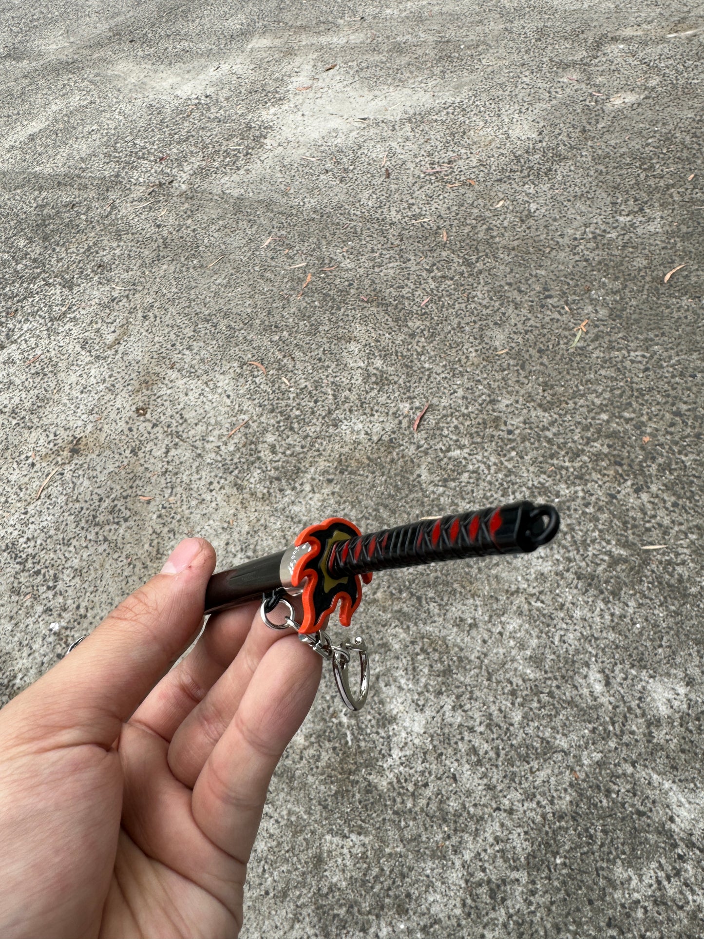 DEMON SLAYER – TANJIRO KAMADO’S FINAL NICHIRIN SWORD V2 KEYCHAIN