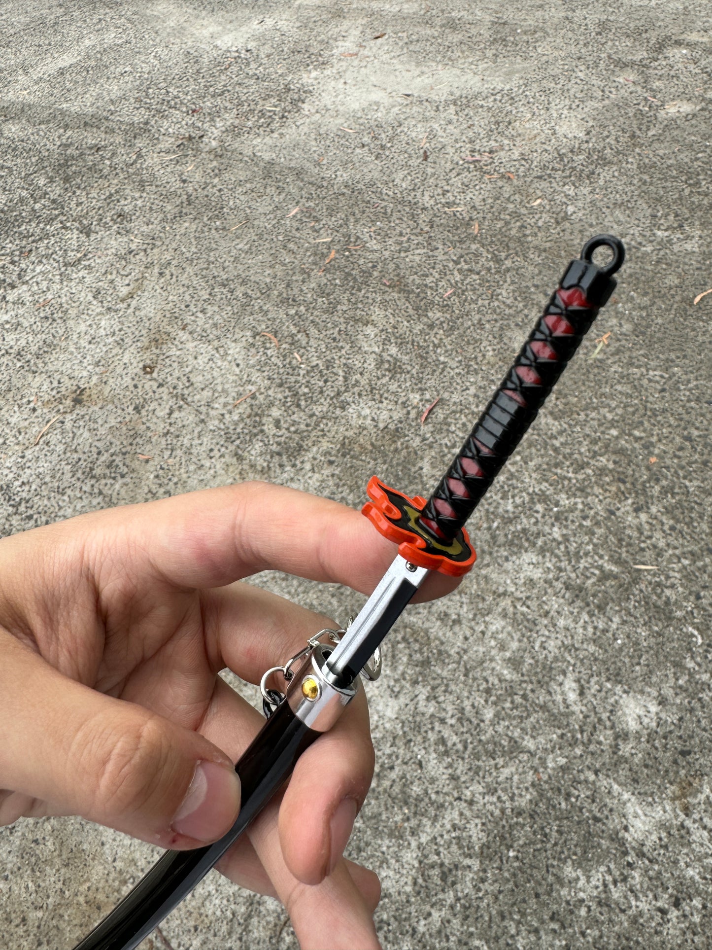 DEMON SLAYER – TANJIRO KAMADO’S FINAL NICHIRIN SWORD V2 KEYCHAIN