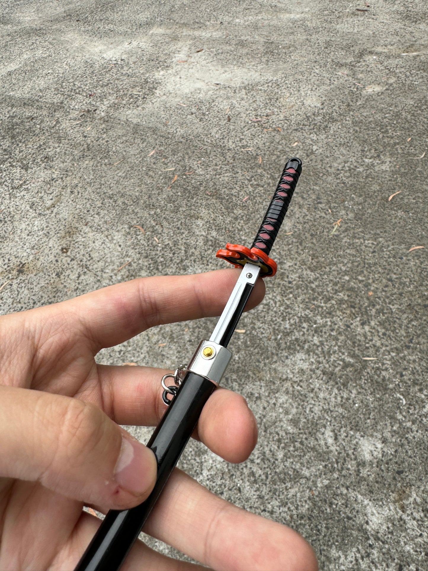 DEMON SLAYER – TANJIRO KAMADO’S FINAL NICHIRIN SWORD V2 KEYCHAIN